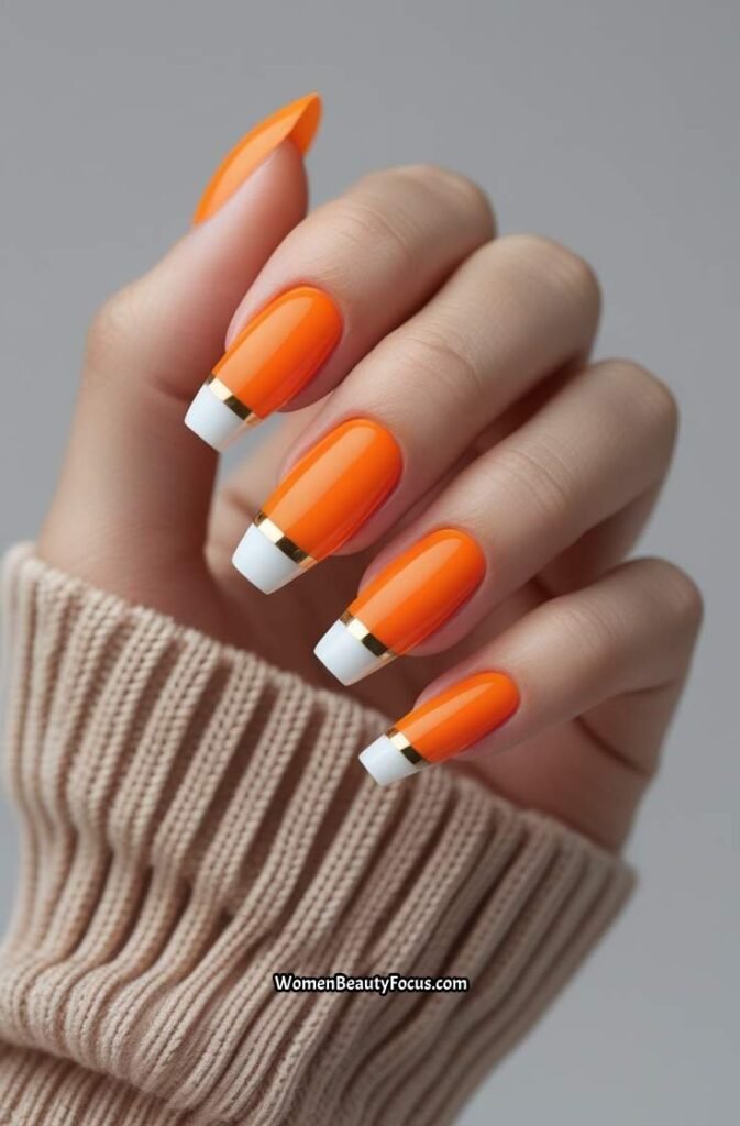 14. Sunset Orange French Tip Nails with Minimalist Stripes