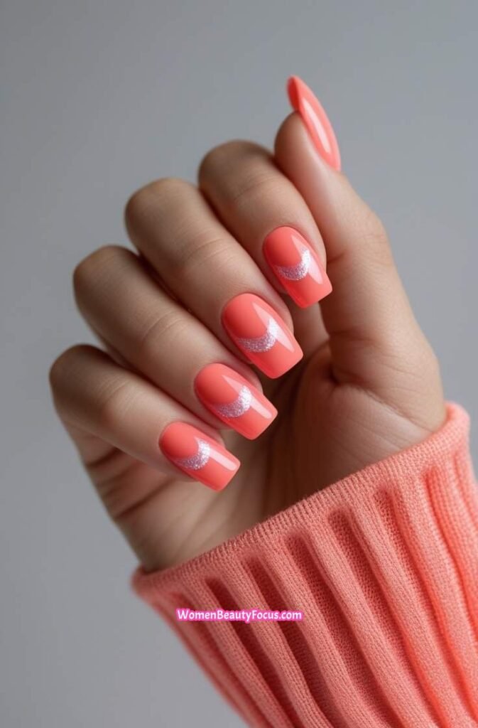 15. Coral Cat Eye Nails with Pink Hues