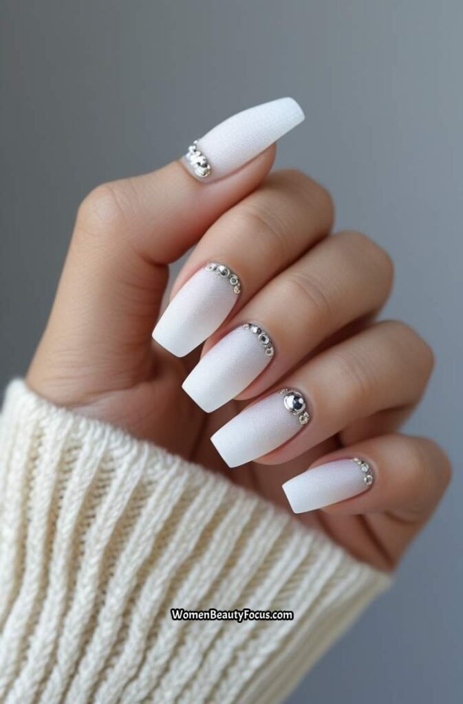 15. Frosted White Nails with Silver Accents