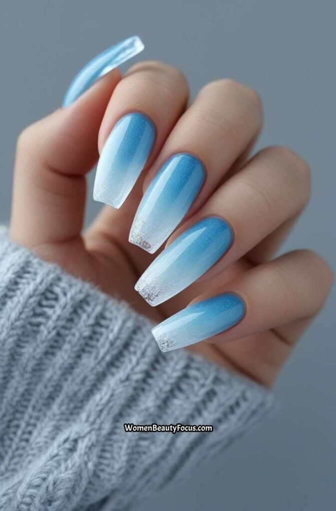 15. Icy Blue Frost Ombre Nails