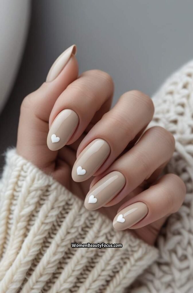 15. Light Beige Nails with Tiny Hearts