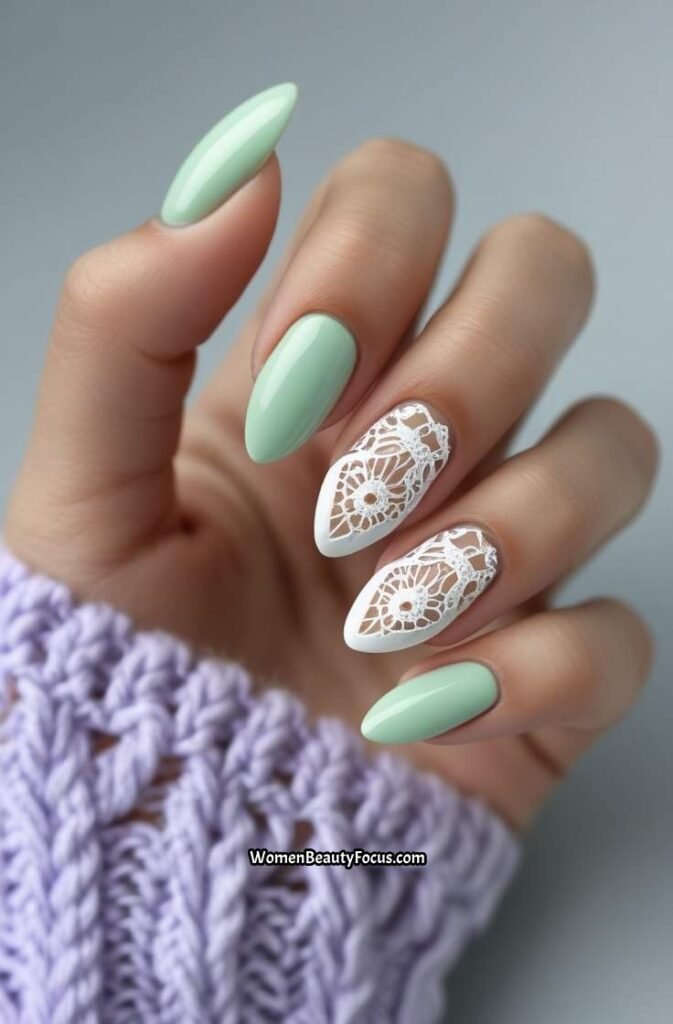 15. Mint Almond Nails with White Lace Detailing