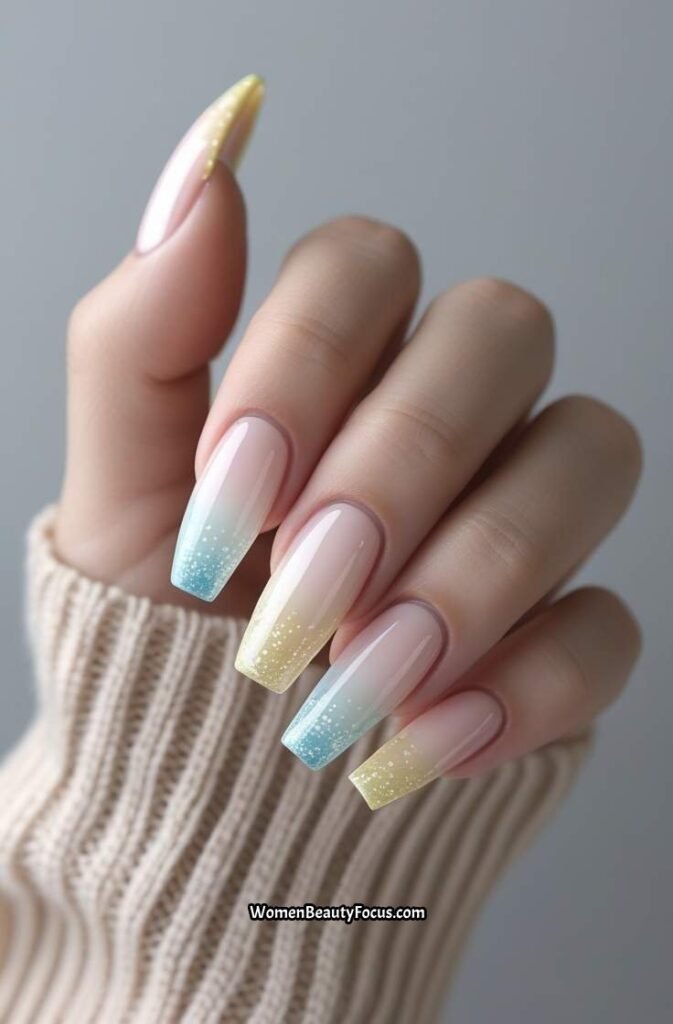15. Pastel French Tips with Glitter Fade