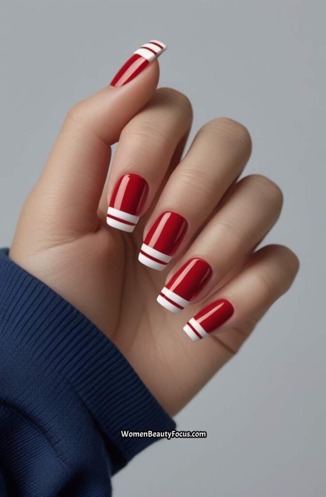 15. Red Nails with White Striped Tips