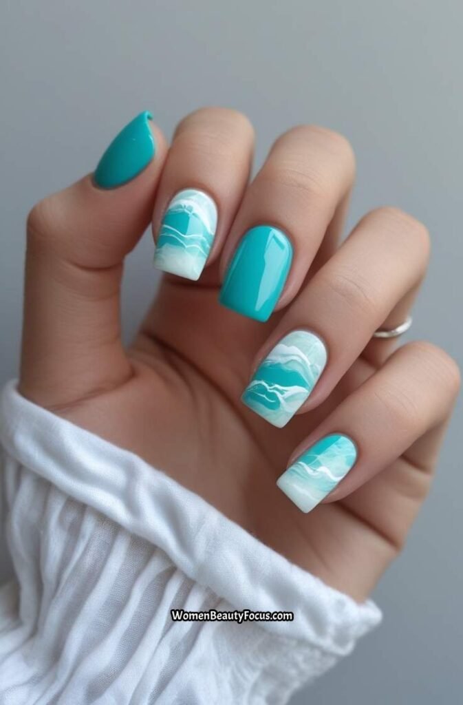 15. Turquoise Square Nails with Marble Effect
