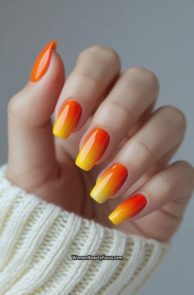 15. Vibrant Orange Gradient Nails