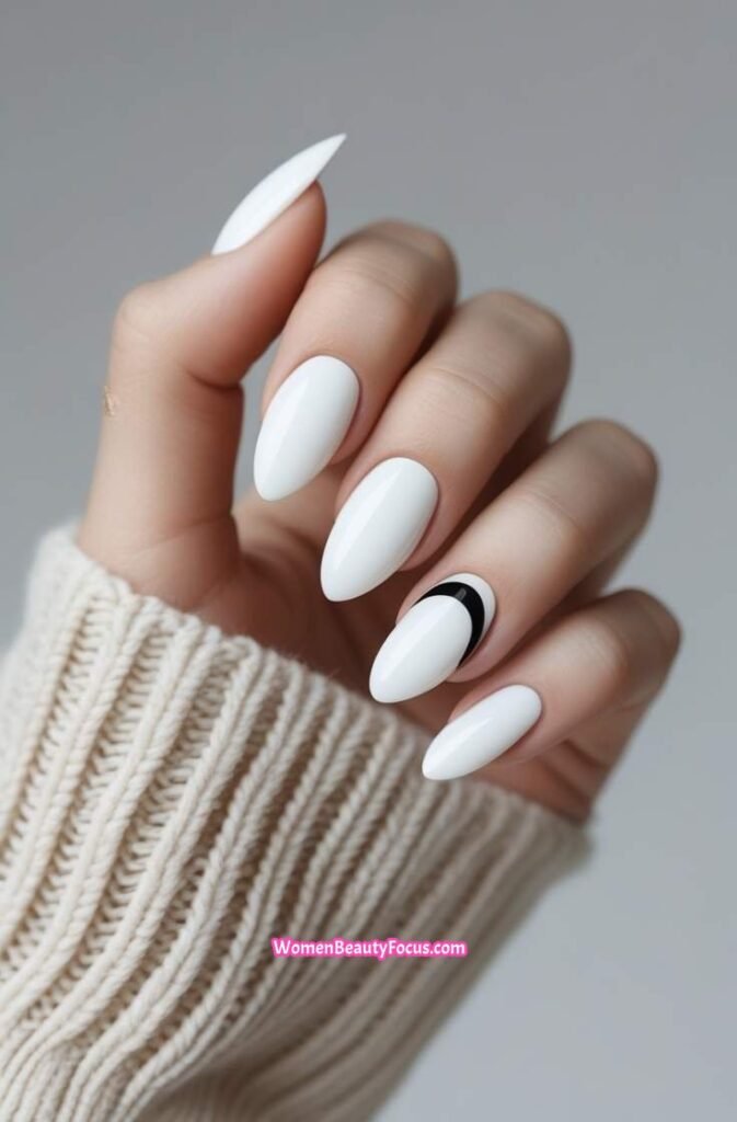 15. White Nails with Black Half Moon Accents