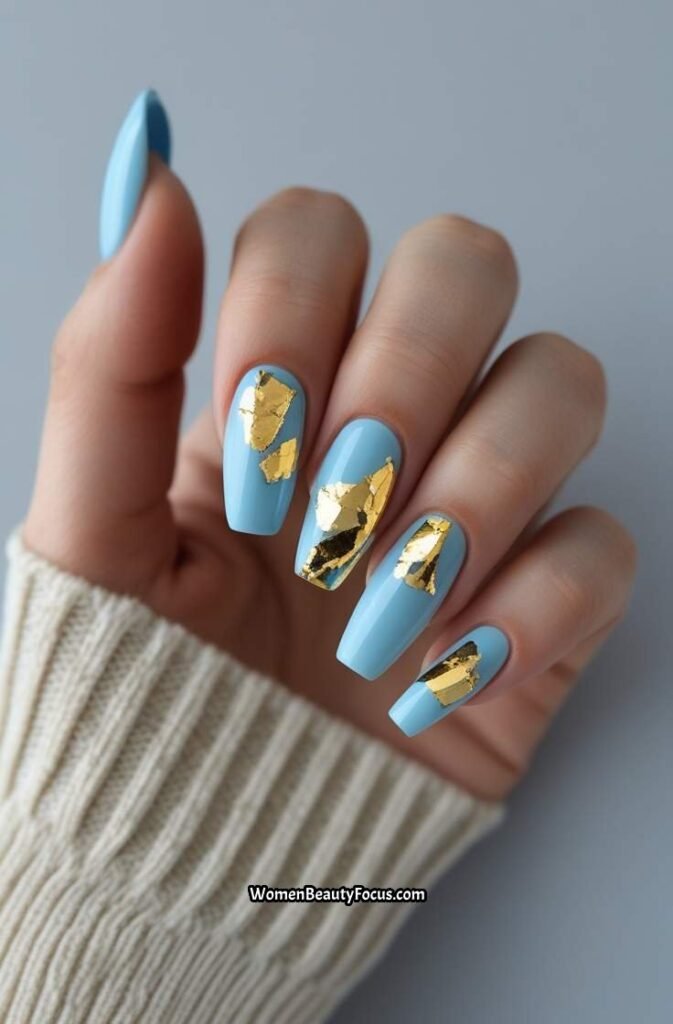 16. Blue and Gold Foil Accent Nails