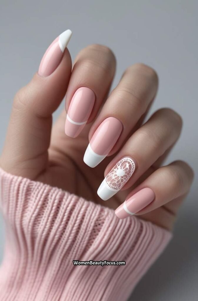 16. Blush Pink French Tips with Subtle Lace Patterns