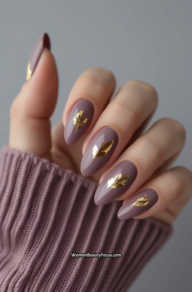 16. Dusty Rose Oval Nails with Gold Leaf Detailing
