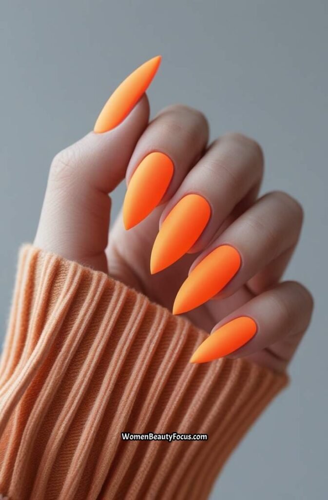 16. Neon Orange Matte Nails
