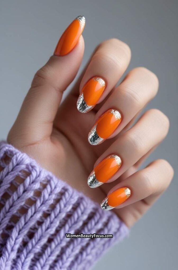 16. Orange Nails with Silver Foil and Glitter