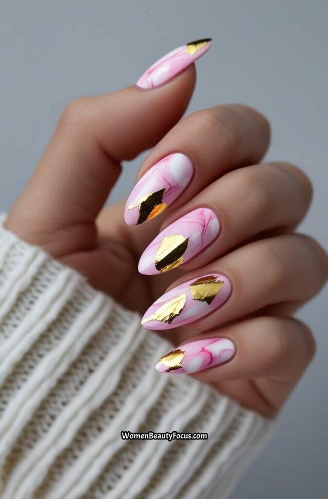 16. Pink Marble and Gold Leaf Nails