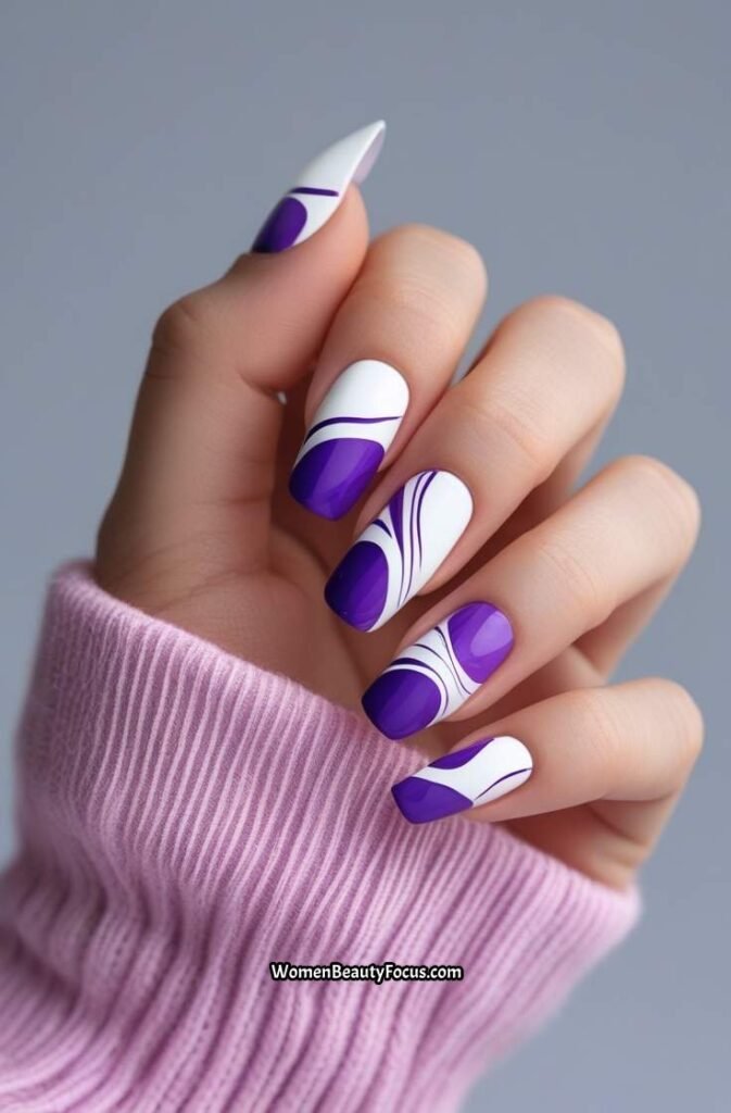 16. Purple and White Abstract Nails