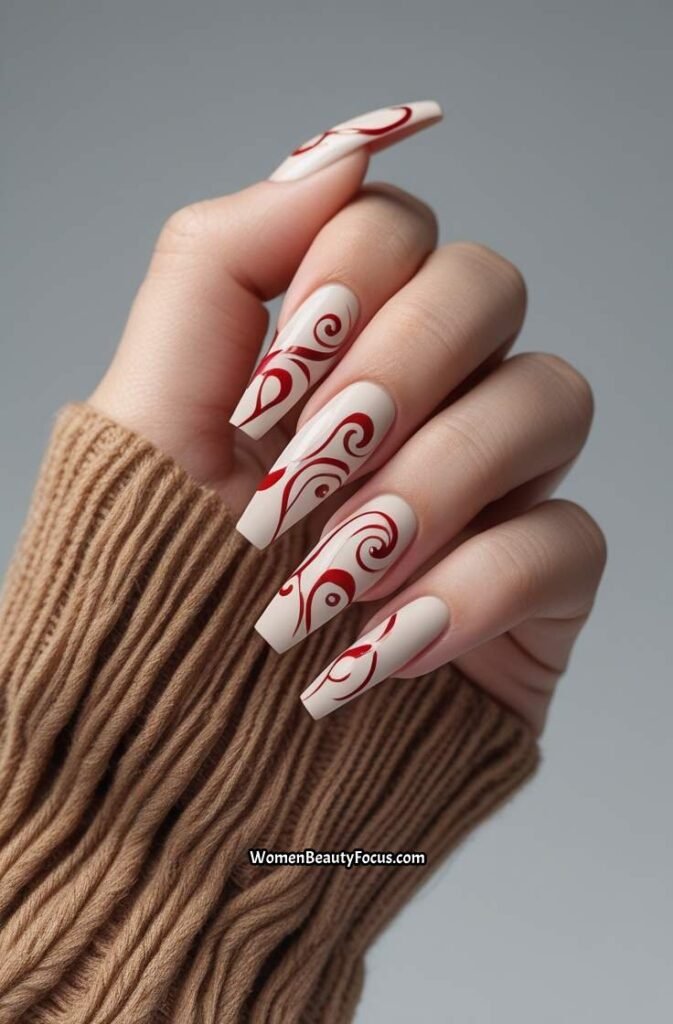 16. Red Swirl Nails on Coffin Shape