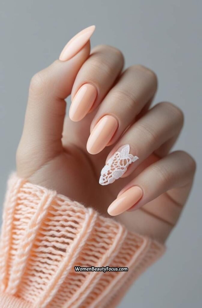 16. Soft Peach Nails with White Lace Detailing