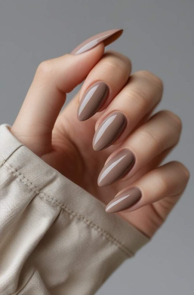 16. Warm Taupe Almond Nails with Glossy Finish