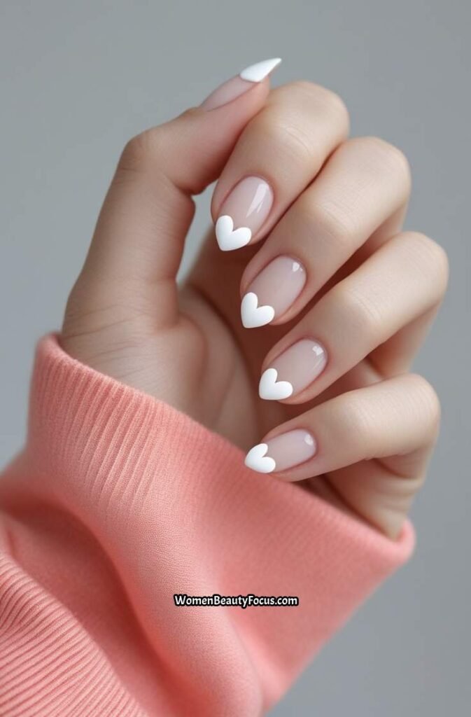 16. White Nails with Heart Shaped Tips