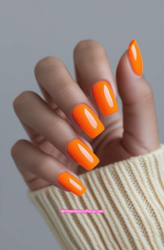 17. Bright Orange Square Nails
