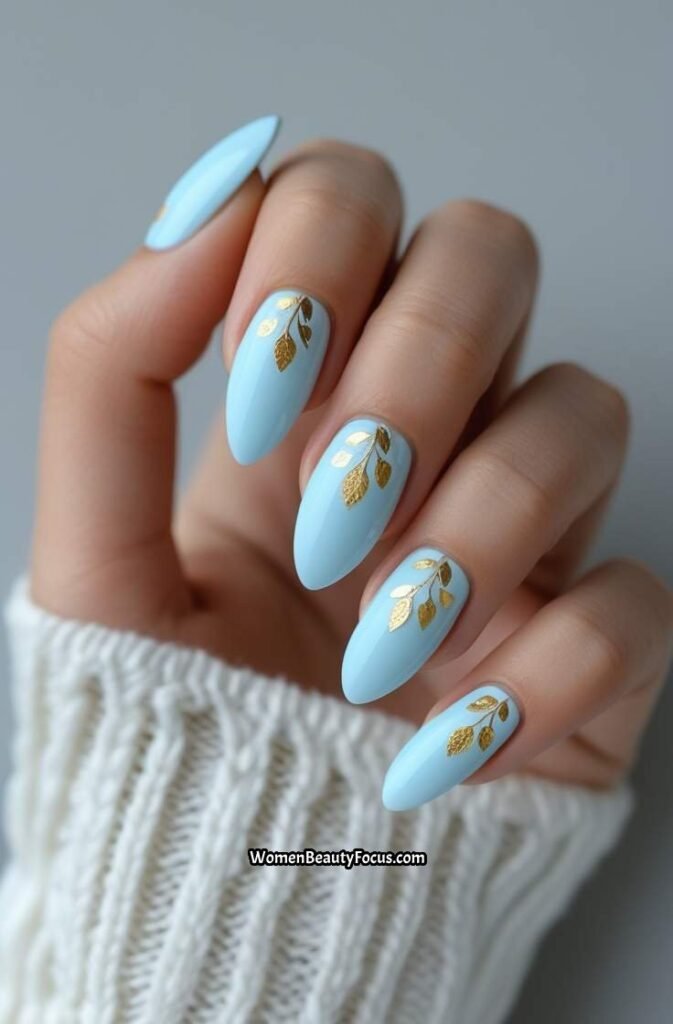 17. Light Blue and Gold Leaf Nails