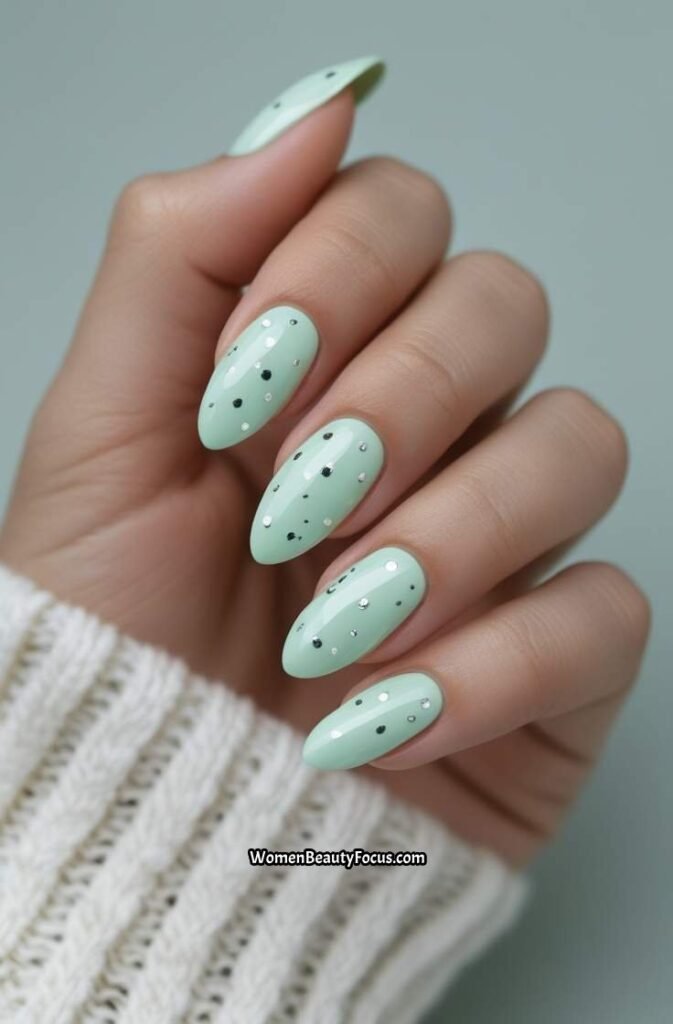 17. Light Mint Almond Nails with Silver Dots