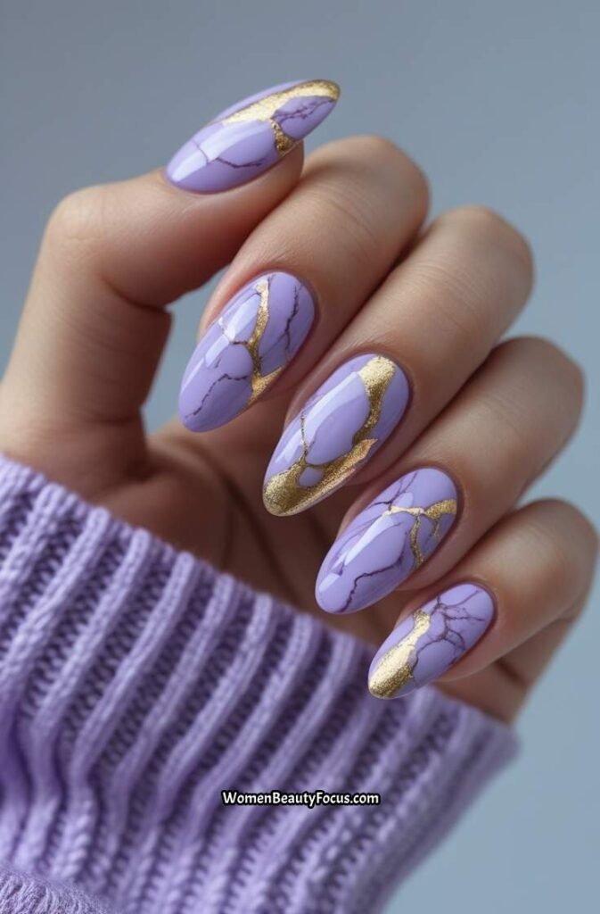 17. Lilac and Gold Marble Nails