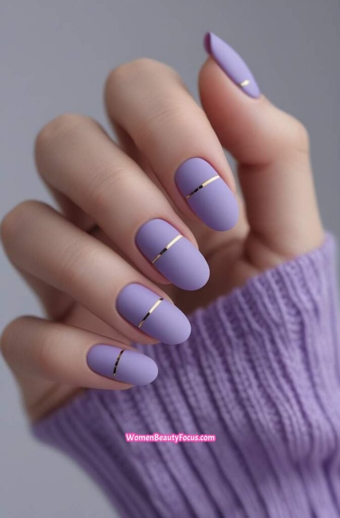17. Matte Lavender Nails with Thin Gold Lines