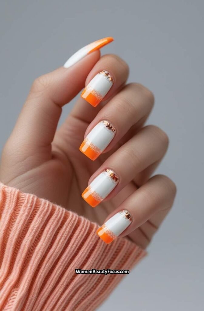 17. Orange and White French Tips with Glitter