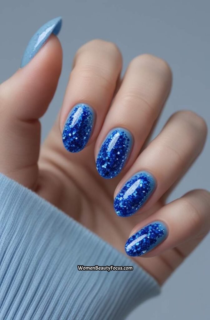 17. Sapphire Glitter Accent Nails