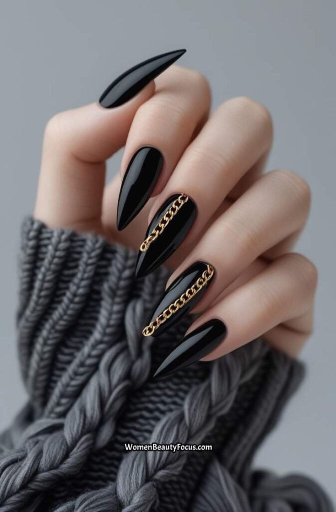 18. Black Nails with Gold Chain Accents