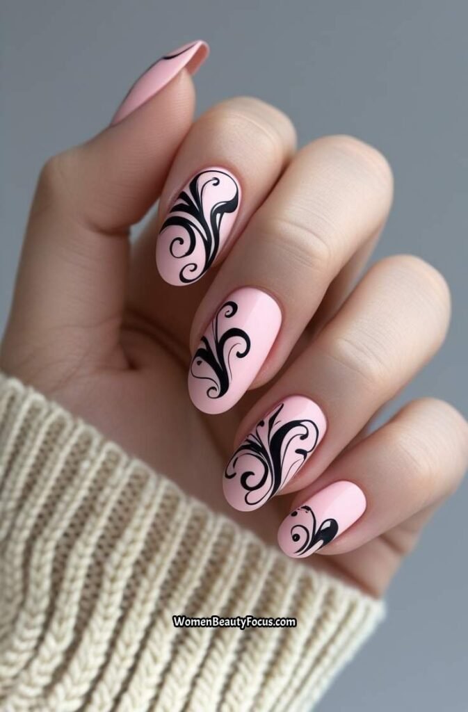 18. Black and Pink Swirl Nails
