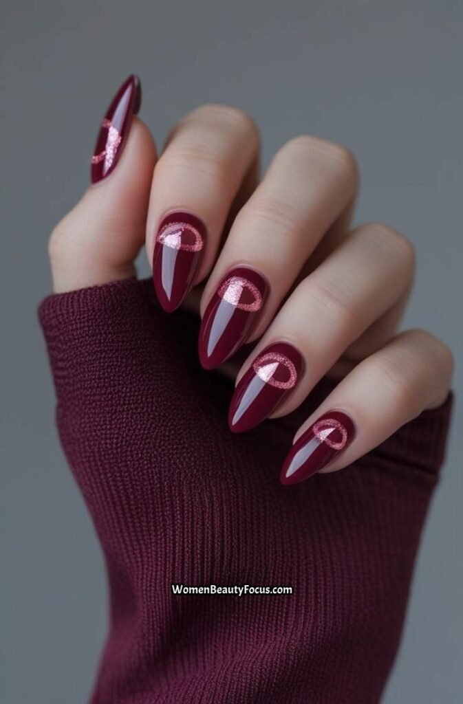 18. Crimson Aura Nails with Deep Pink Center