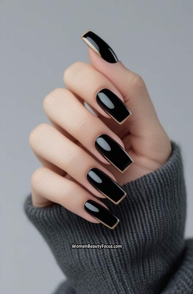 18. Glossy Black French Tips with White Contrast