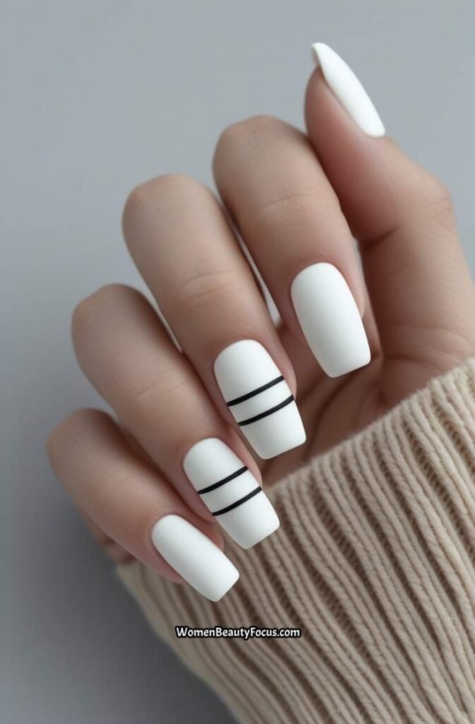18. Matte White Nails with Thin Black Lines
