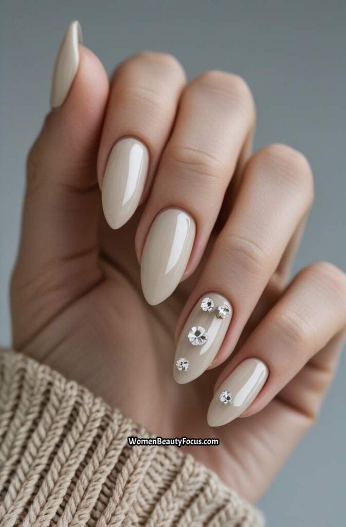 18. Milky Neutral Nails with Crystal Accents