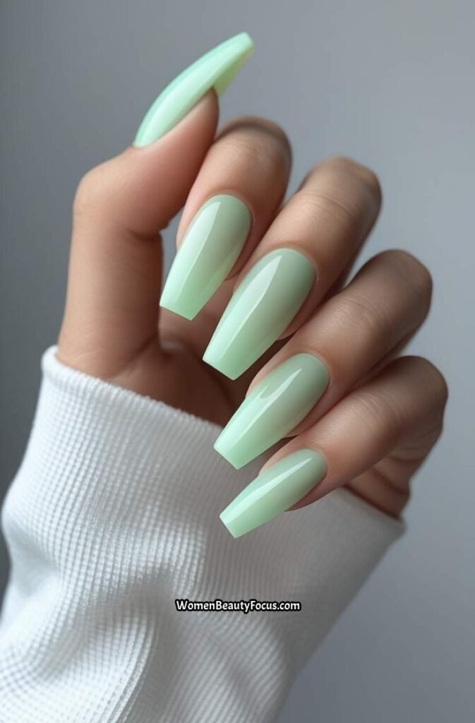 18. Pale Mint Green Coffin Nails with Sheer Shine