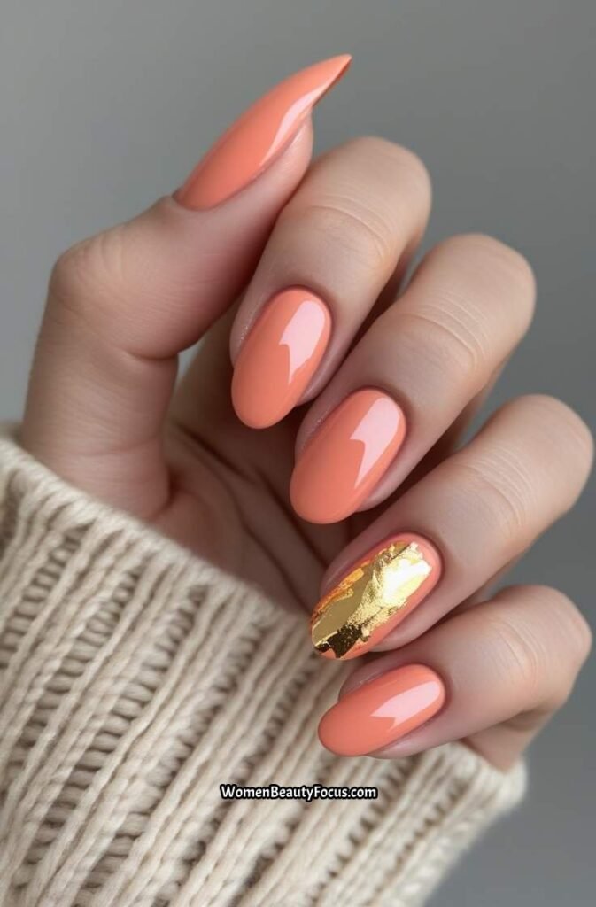 18. Soft Coral Nails with Gold Leaf Detail