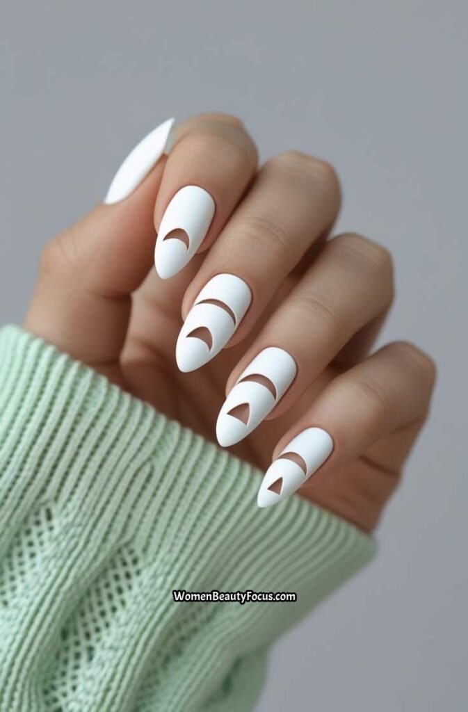 18. White Nails with Negative Space Cut Outs