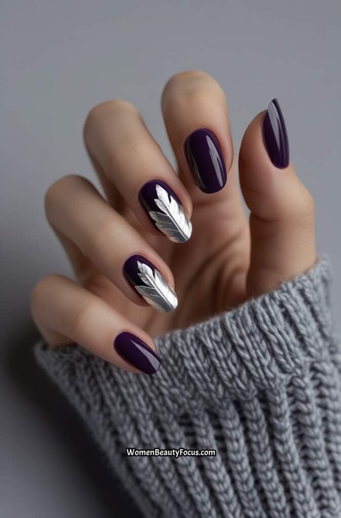 19. Dark Purple and Silver Leaf Nails