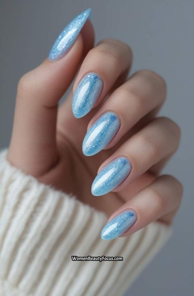 19. Ice Blue Shimmer Nails 1