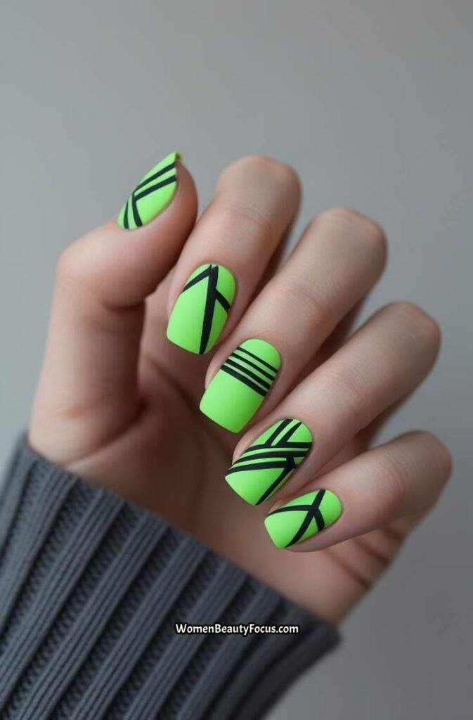 19. Neon Green and Black Nail Art
