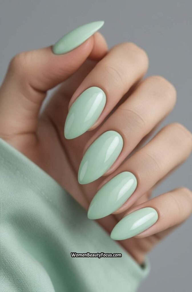 19. Pale Mint Almond Nails with Glossy Shine
