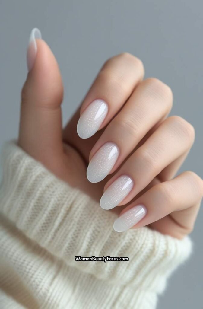19. Sheer Milky White Nails with Micro Sparkle