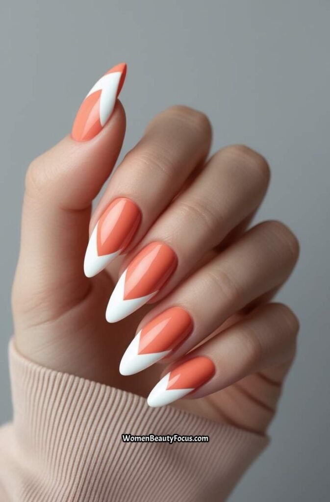 19. Soft Coral Nails with White Chevron Tips