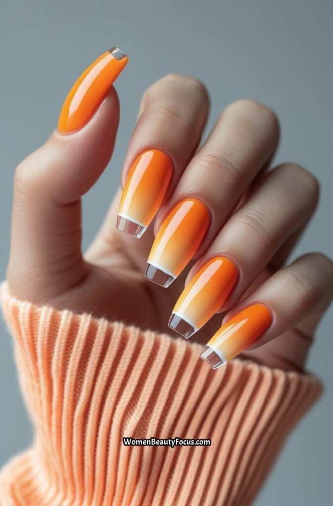 19. Tangerine Coffin Nails with Clear Tips