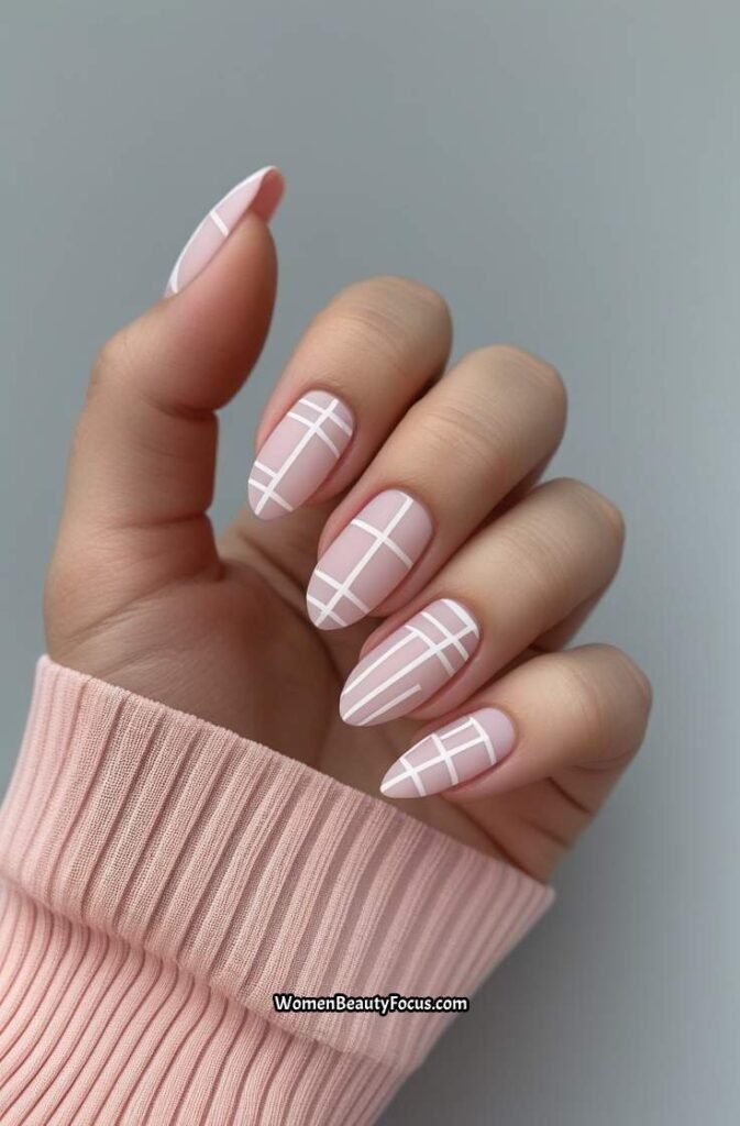 19. White Geometric Nail Art