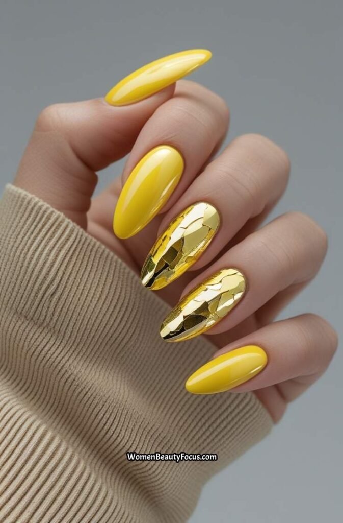 19. Yellow Chrome Nails with Gold Foil Accents