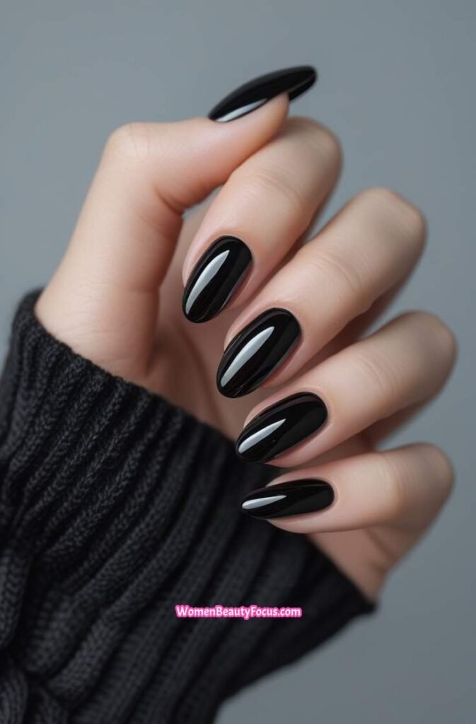 2. Black Chrome Nails with a Touch of Glam
