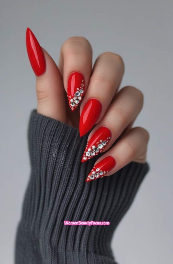 2. Bold Red Stiletto Nails with Rhinestone Detailing 2 IMGCentury
