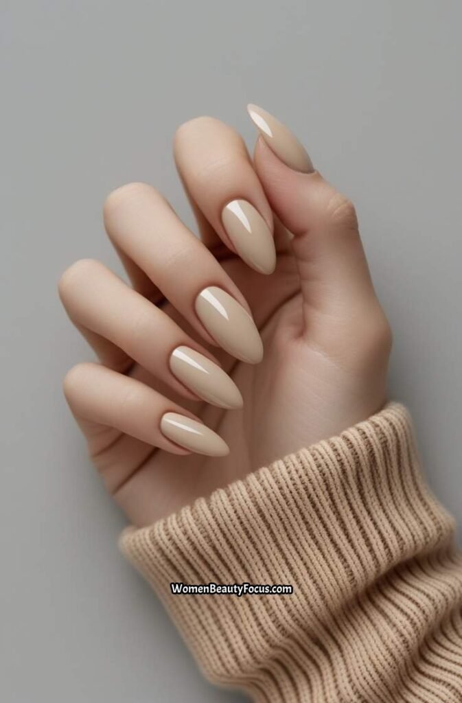 2. Classic Almond Nails in Neutral Beige